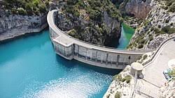 🏗️ Le Barrage : Le géant de béton